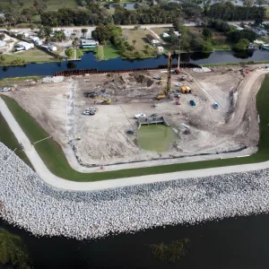 With a cofferdam in place, crews excavate Herbert Hoover Dike at Culvert 8 near Okeechobee in December 2016.