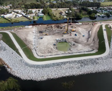 With a cofferdam in place, crews excavate Herbert Hoover Dike at Culvert 8 near Okeechobee in December 2016.