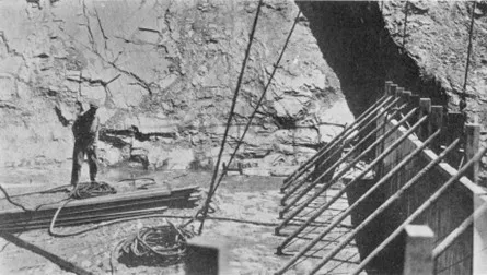 East abutment of the St. Francis Dam just before concrete placemen, showing the mica schist talus and the absence of a cutoff trench