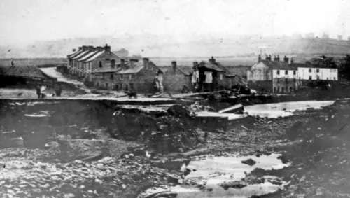 Flood damage to buildings along River Loxley after Dale Dyke Dam breach